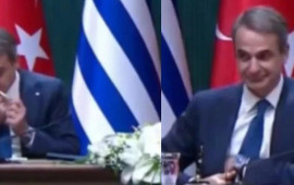 Burnunu silib sənəd qovluğuna qoydu 